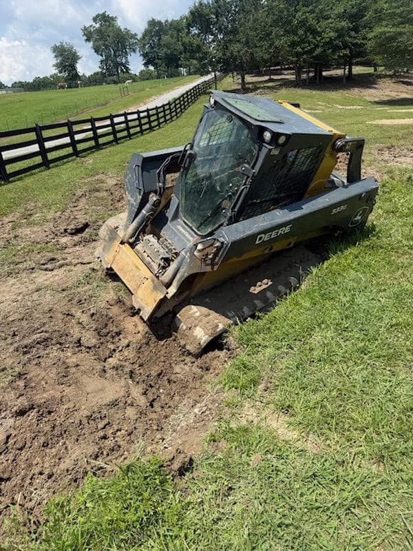Gallery photos for Skid Steer Buried in Mud? We Winch It Out: Image #1