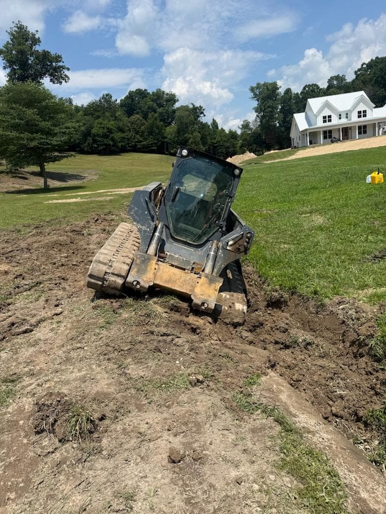 Skid Steer Buried in Mud? We Winch It Out image