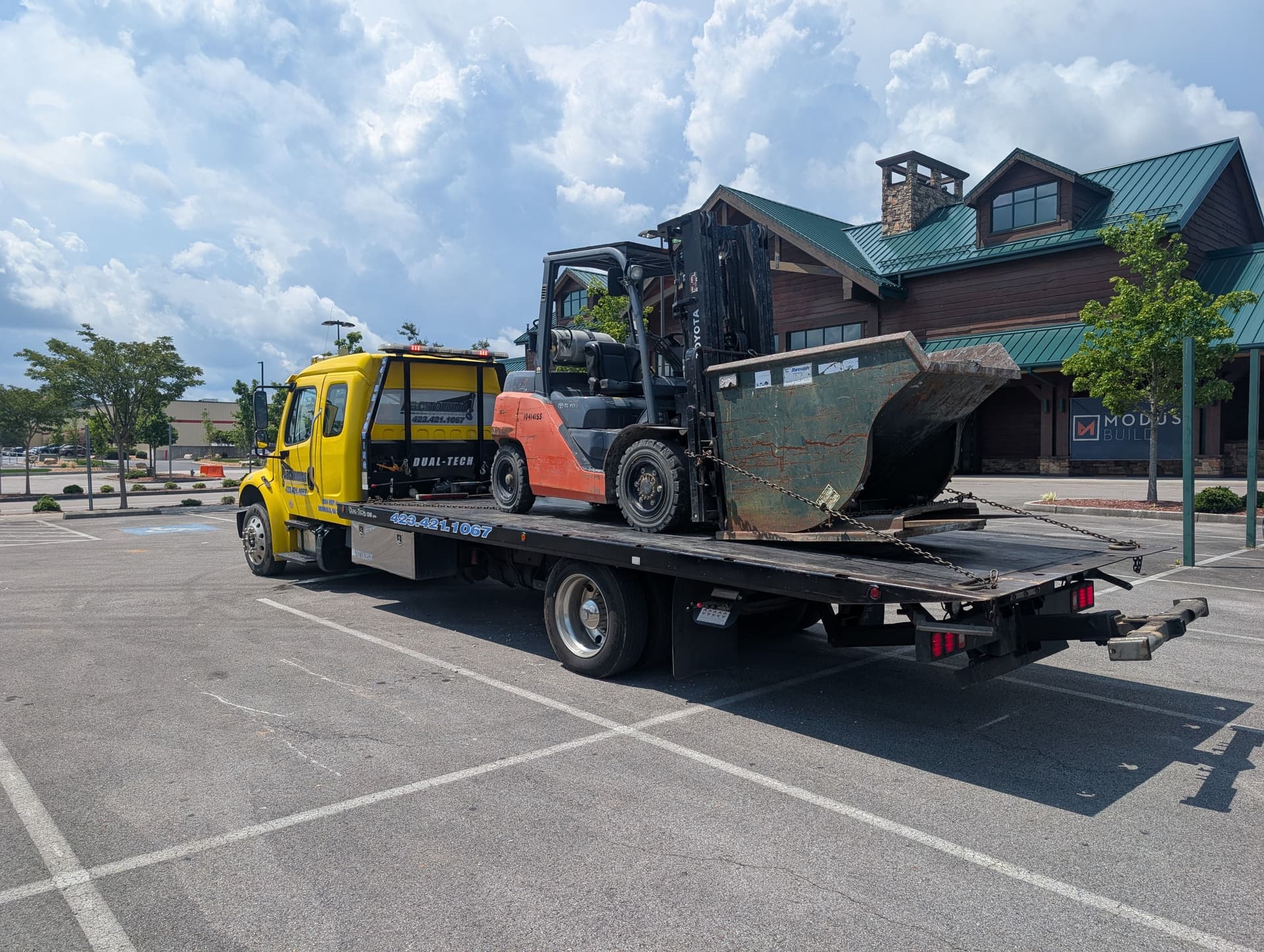 Gallery photos for Forklift and Dumpster Hauled to Keep a Job Site Moving: Image #1