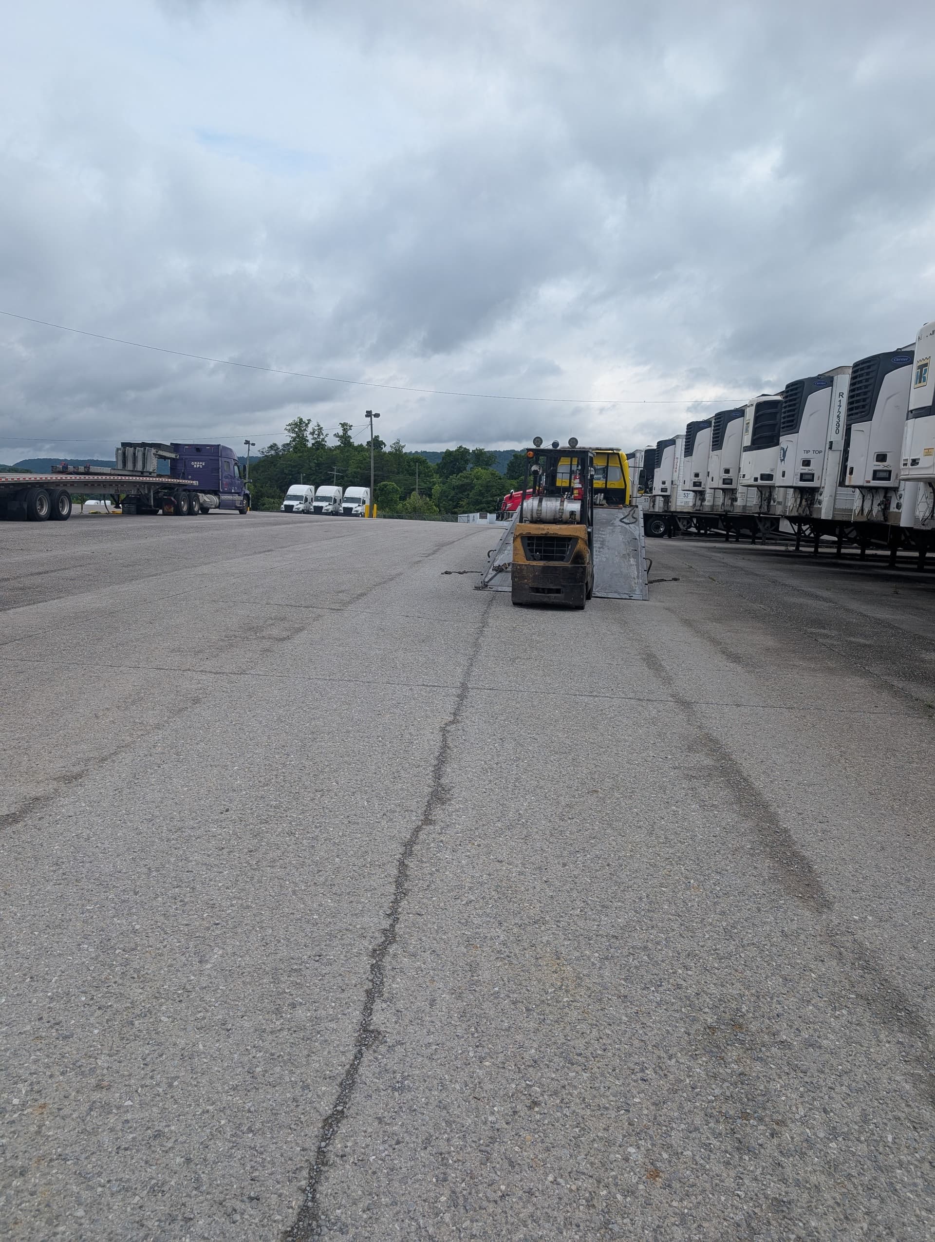 Gallery photos for Heavy Haul Done Right - Loading Semi Trailer Z-Bars with a Forklift: Image #9