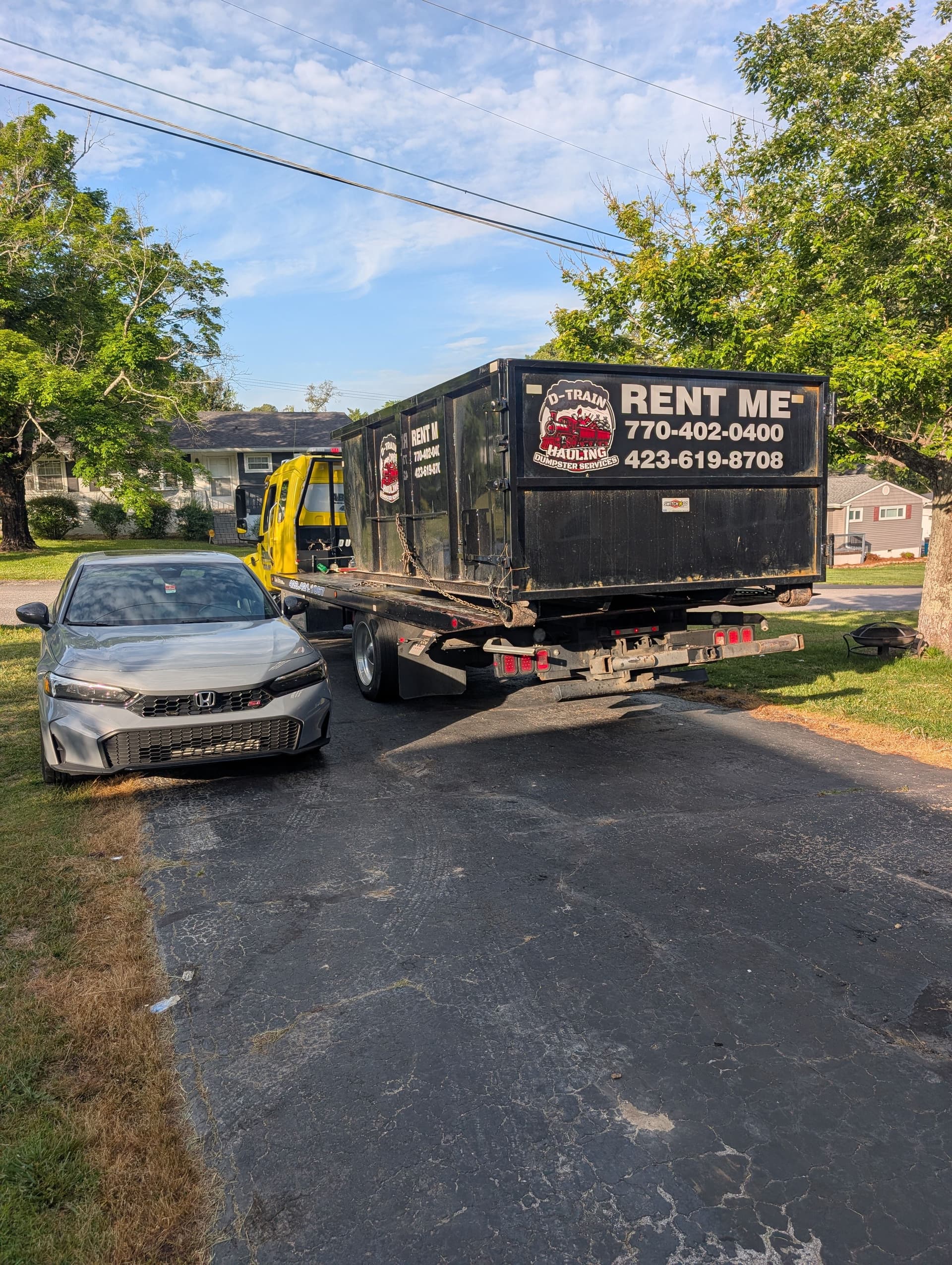 Hauling Roll-Off Dumpsters When It Matters Most image